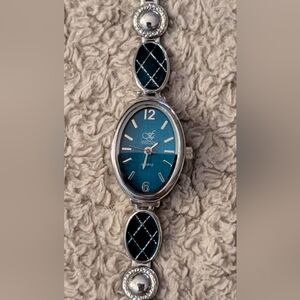 WORKING Women's Teal / Turquoise Silver Tone Watch Oval Face